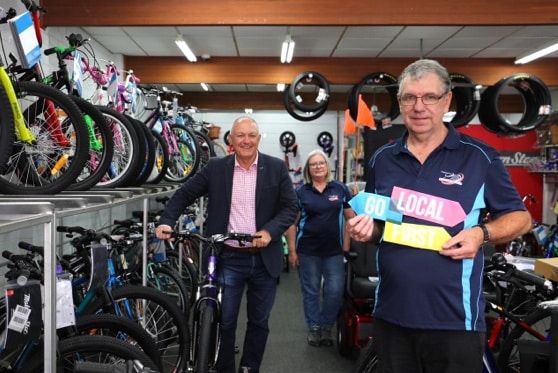 Owner And Customer — Bike Store in the Central Coast